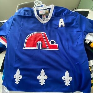 CCM Blue Hockey Jersey with Red Logo